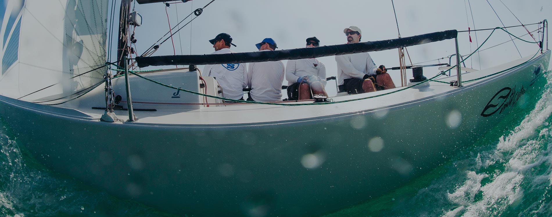 sailors on a sailboat